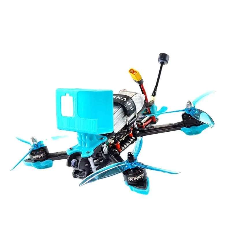Small FPV racing drone with camera, blue propellers and frame