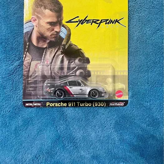 Diecast model car in blister pack, Porsche 911 Turbo (930) Real Riders, Mattel