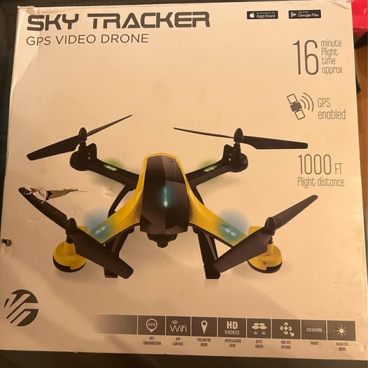 GPS video drone with black and yellow body and four propellers