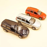 1:36 diecast car model toy in black, white, and orange with detailed body panels