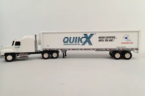 1:64 diecast box truck with Quik X logo, white trailer and blue cab