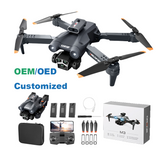 Foldable quadcopter drone with HD camera, orange propellers, black/gray body
