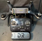3DR Solo quadcopter drone with four prop arms and propellers, dark body