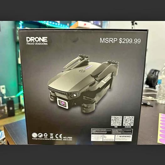 Drone retail box with printed drone and specs, MSRP $299.99