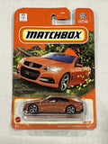 Matchbox 1/64 diecast toy car, orange Holden VF Commodore SSV #68, in blister pack