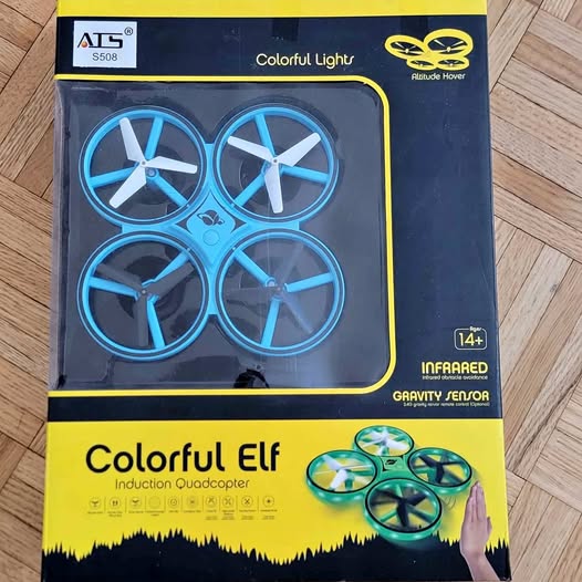 Induction quadcopter box with blue glowing four-rotor design