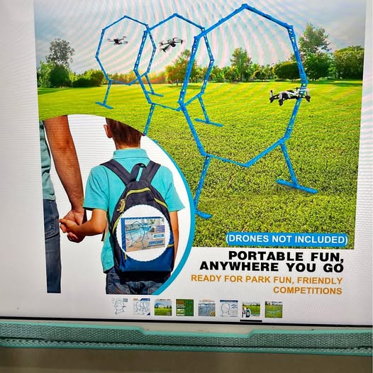 Inflatable drone obstacle course frame set with blue polygon hoops for outdoor use