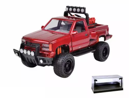 Red 1/24 diecast pickup truck with LED light bar, open cab and black tires