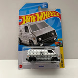 Silver diecast 70s van with black grille, Hot Wheels card packaging