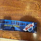 Blue die-cast replica Greyhound bus model with Vintage Bus Line graphic
