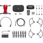 Black quadcopter drone and remote controller accessory parts set with propellers