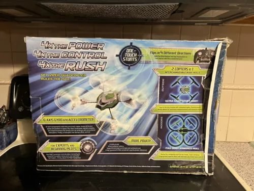 Boxed drone set with remote, quadcopter accessories and 2-in-1 propeller pack