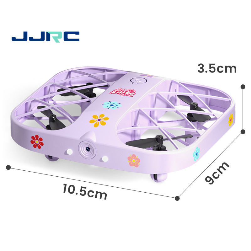 White and purple quadcopter drone toy with four propellers and flower decals