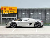 Silver 1:64 scale super racing sports car diecast model with black wheels