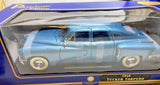 Teal/blue 1948 Tucker Torpedo diecast model car in clear display box