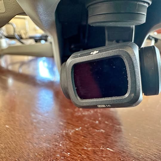 DJI drone camera gimbal with protected lens housing