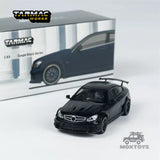 Black diecast coupe model car with front grille and headlights