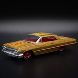 1:64 scale diecast model car, yellow with red interior, chrome grille, red wheels