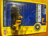 Yellow construction front loader diecast toy in blister packaging on card