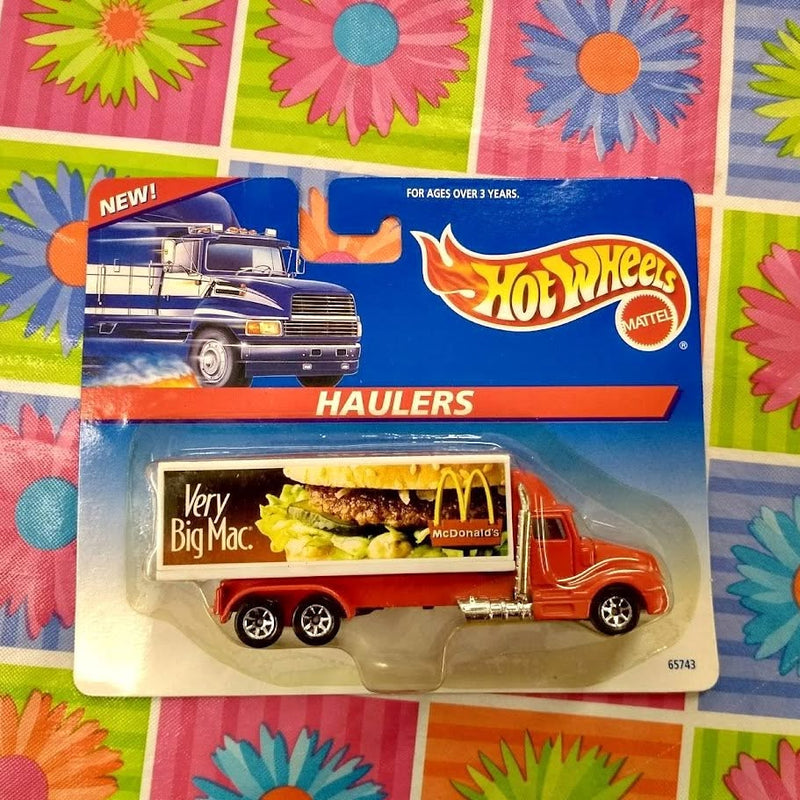 Hot Wheels Haulers diecast McDonald's Very Big Mac orange hauler truck in box