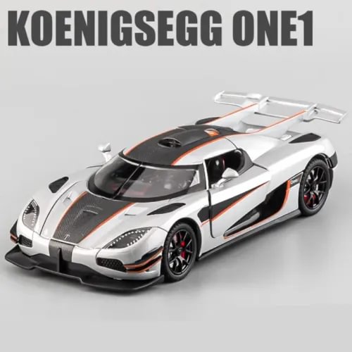 Koenigsegg ONE:1 1:24 diecast sports car model, white with black stripes and red accents.