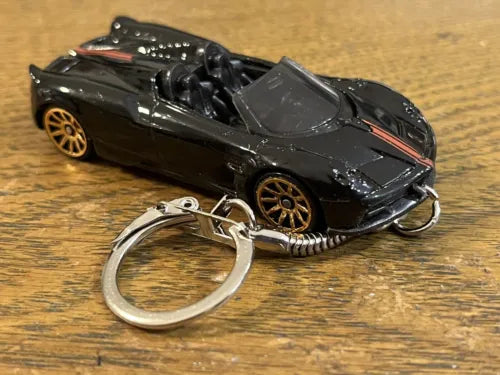 Diecast toy car keyring, black model car with silver metal key ring and hinge