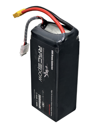 Black drone battery pack with red and black wires and connector