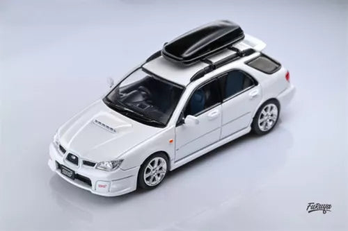 Diecast model car toy, white Impreza with black hood and roof, front three-quarter view