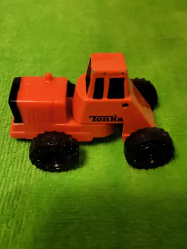 Orange Tonka mini metal diecast tractor truck with black wheels