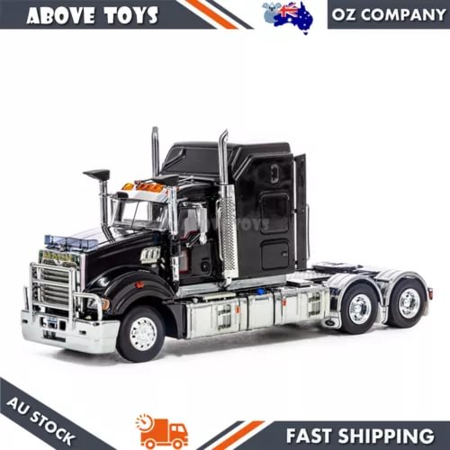 Black diecast model truck with chrome grille and cab, detailed front tractor unit