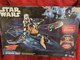 Remote-controlled speeder bike drone box with yellow and gray vehicle artwork