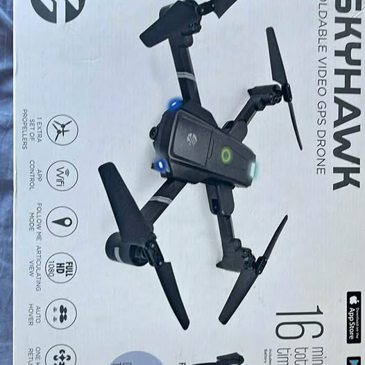 Foldable quadcopter drone with black body and blue indicator lights, front camera