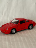 Red diecast toy car Porsche 911 Carrera, 1:36 scale, front 3/4 view