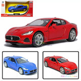 Red diecast model car with openable doors and front wheel detail, 1:36 scale toy
