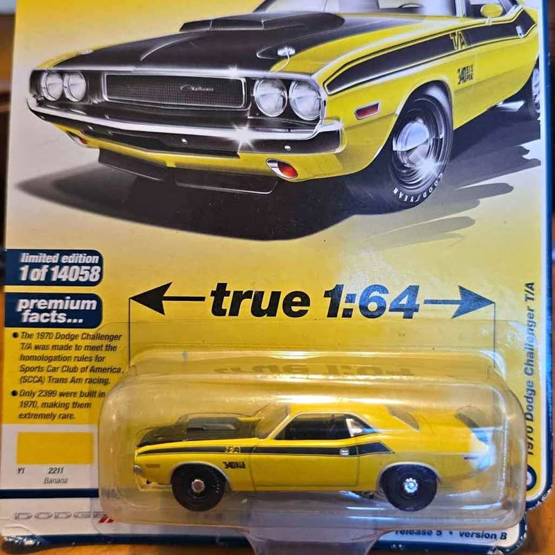 Yellow and black 1970 Dodge Challenger T/A diecast car in blister pack
