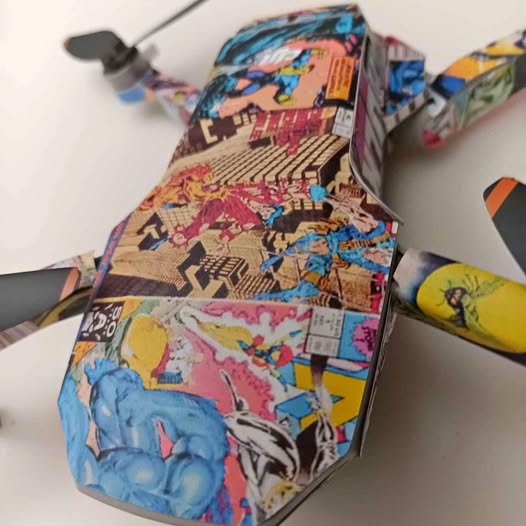 DJI mini 2 drone with colorful printed body and propellers