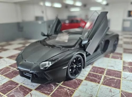 Matt black Lamborghini Aventador diecast model car, 1/24 scale, doors open