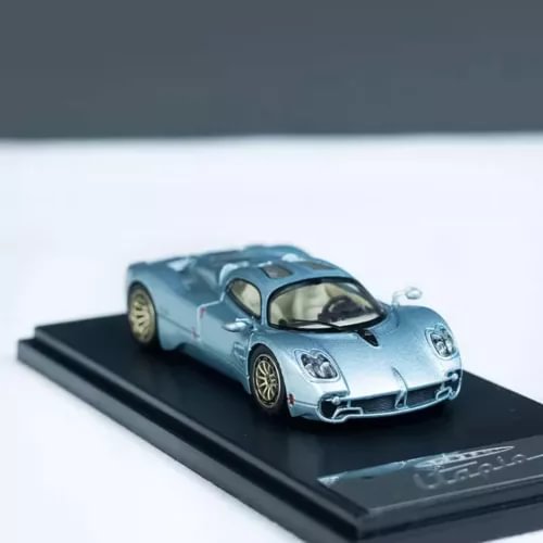 1/64 scale Pagani Utopia blue diecast model car on display base