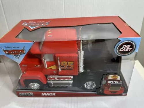 Mack #95 diecast model in open display box, red and gray car with wheels visible