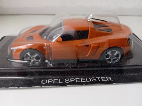 Orange Opel Speedster diecast model car in clear display case, front view