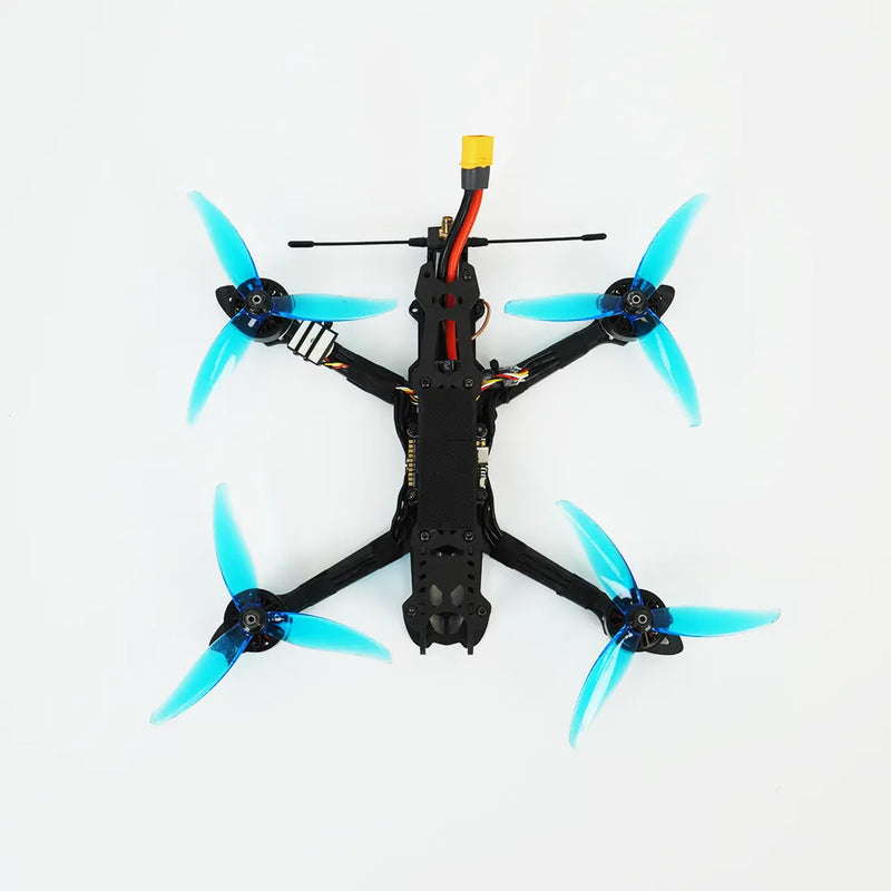FPV quadcopter drone with black frame and blue propeller blades