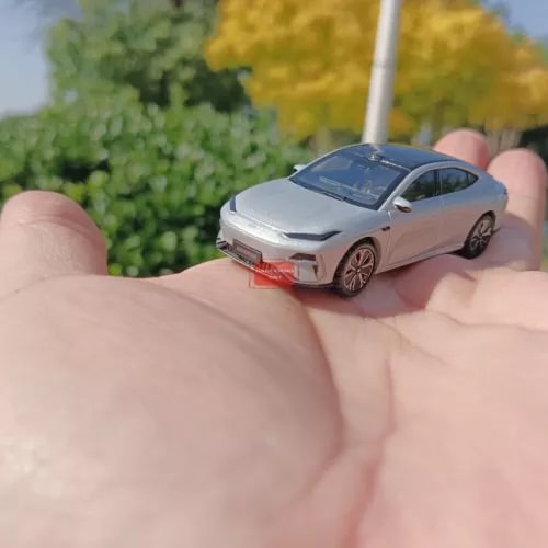 Geely Galaxy E8 diecast model car, silver body with detailed rear and wheels