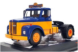 Yellow and blue diecast model truck, front cab view with orange wheels