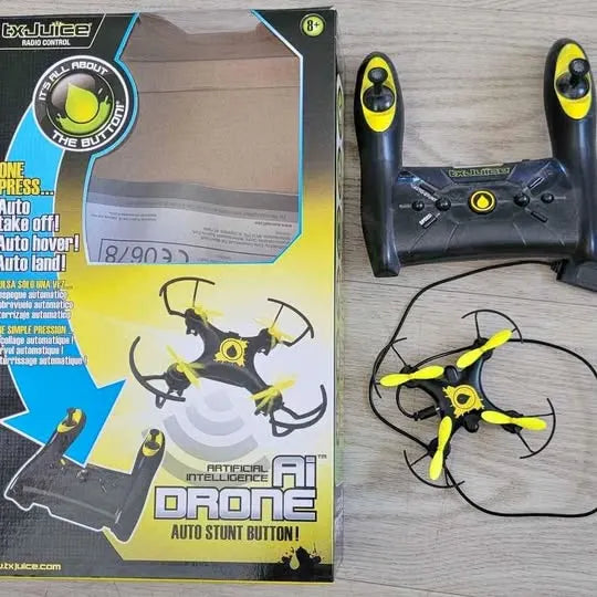 Remote-control stunt drone retail box, yellow and black with controller and quadcopter