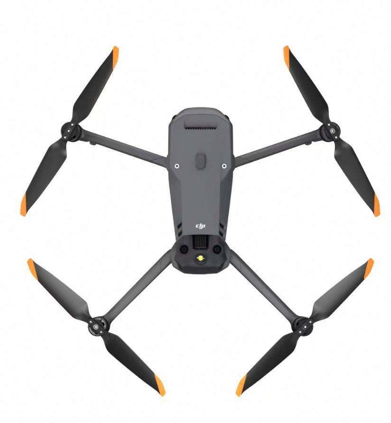 Gray quadcopter drone with four foldable arms and orange propeller tips