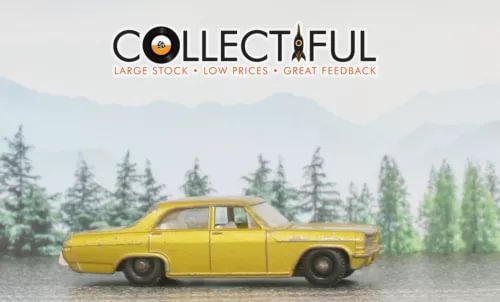 Matchbox Lesney diecast car, yellow four-door sedan with black wheels
