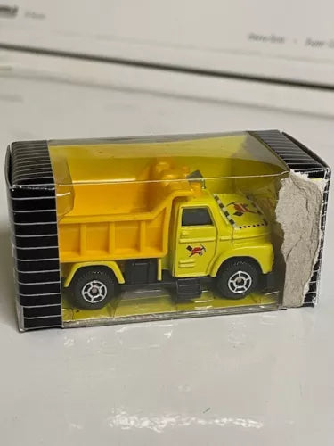 Yellow die-cast road truck with snow plow, in retail box