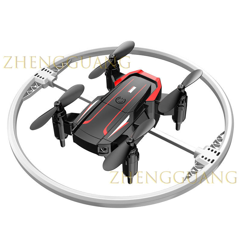 Mini RC quadcopter drone with four propellers, black and red body