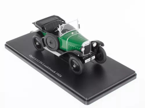 Green and black 1:24 diecast vintage car model with black display base