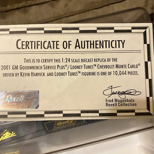 Certificate of Authenticity card for 1:24 scale diecast model, signed
